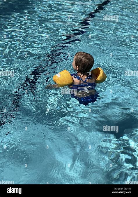 Child floaties hi-res stock photography and images - Alamy