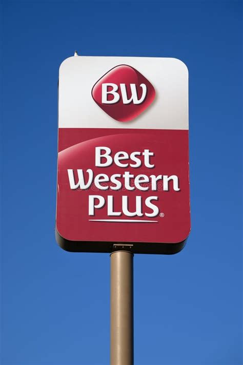 Vertical Red and White Sign Against Blue Sky for Best Western Plus ...