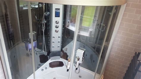 Aqualusso Corner jacuzzi bath with shower enclosure, built in radio and ...