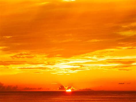 698,200+ Orange Sunset Sky Stock Photos, Pictures & Royalty-Free Images ...