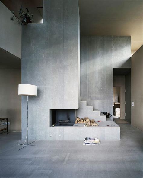 Explore living room ideas with concrete wall interior design - Kadva Corp