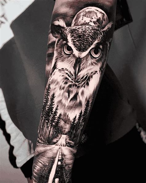 an owl tattoo on the arm with trees