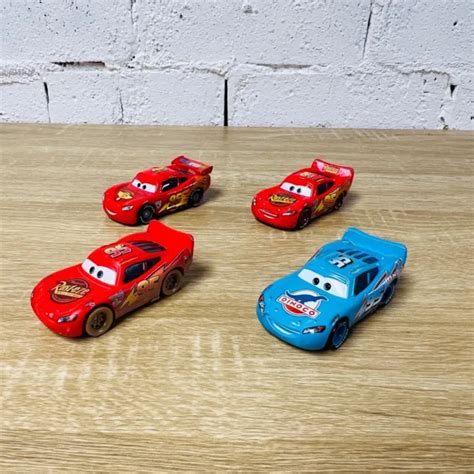 DISNEY PIXAR CARS Die-Cast Lightning Mcqueen with Racing Wheels World ...