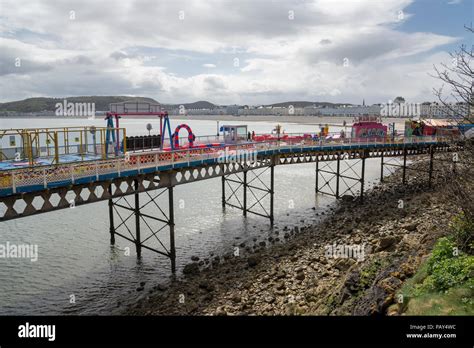 Childrens attractions on the pier at Llandudno, North Wales, UK Stock ...