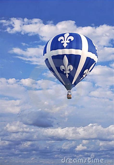 st jean baptiste day, pictures parades | ... in a blue cloudscape sky ...