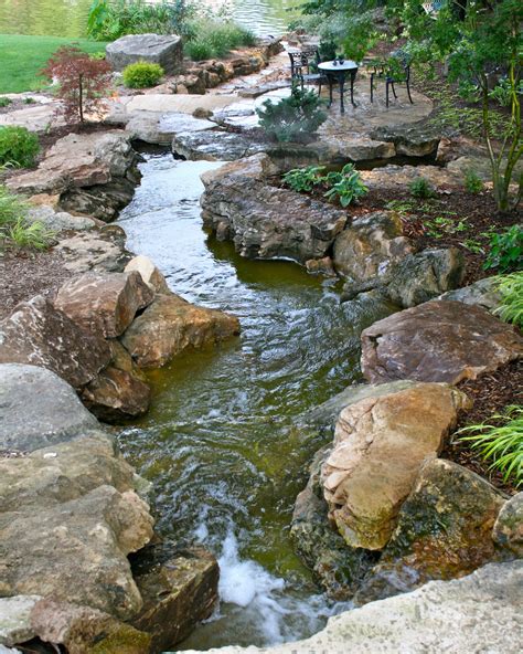 Backyard water feature | Waterfalls backyard, Backyard stream, Backyard ...