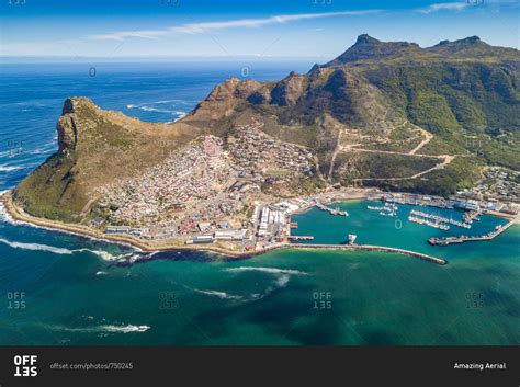 Aerial panoramic view of Hout Bay Harbor, yachts and hillside town ...