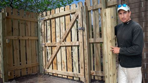 wooden gate installation - kobo building