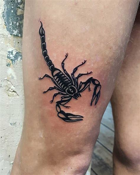 Scorpion tattoo on the right thigh - Tattoogrid.net