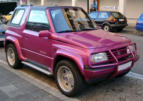 Purple Suzuki Vitara Parked on the Side of the Road