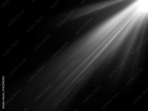 abstract beautiful rays of light on black background. Stock Photo ...