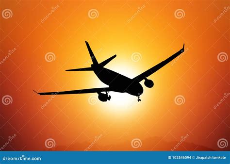 Silhouette Airplane at Sunset Stock Photo - Image of landing, evening ...