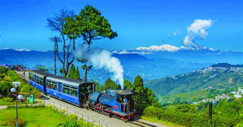 Toy Train ride in hills of Darjeeling - India Chalk