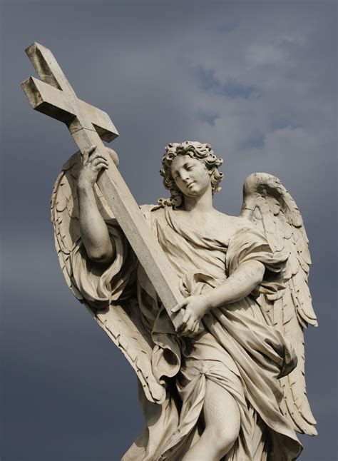 A statue of an angel carrying Christ’s cross is seen on the Castel Sant ...