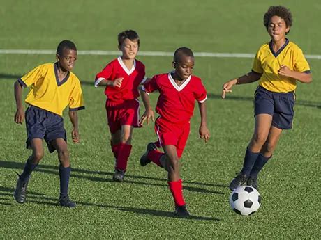 Black Kids Playing Soccer