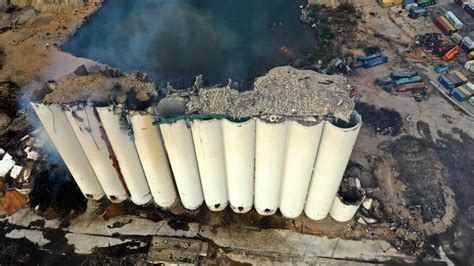 Lebanese mourn, seethe as damaged and neglected Beirut port silos fall ...