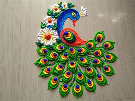 Beautiful peacock rangoli design | | Colorful rangoli designs, Rangoli ...