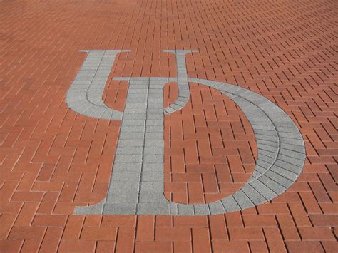 Download "University of Delaware Logo on Brick Wall" Wallpaper ...