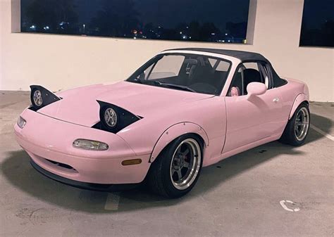 Pink Sports Car in Parking Lot