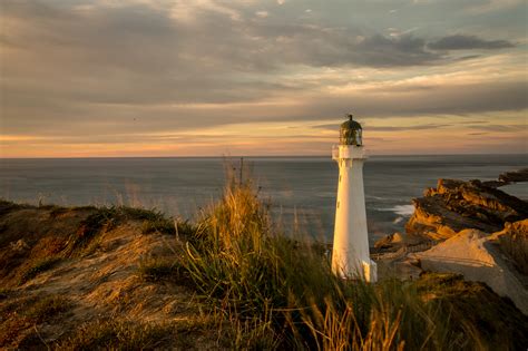 Castlepoint Lighthouse Sunrise Lake Ferry Sunset - Becoming Kiwi Day 5 ...