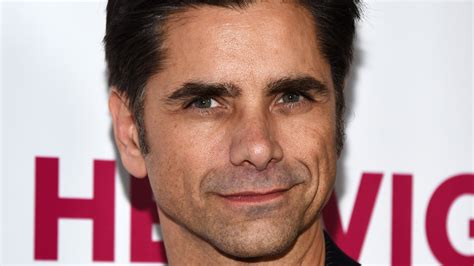 John Stamos Gives Himself a Haircut With Precision | Allure