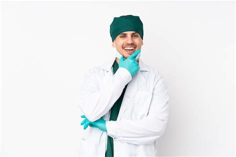 Premium Photo | Surgeon in green uniform smiling