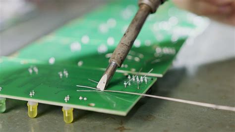 Manual soldering of wires and components on a PCB board Stock Video ...