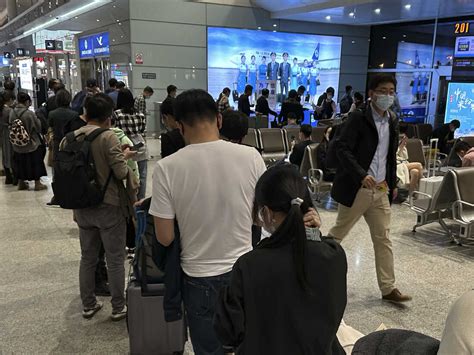 China to resume issuing passports, visas as virus curbs ease : NPR