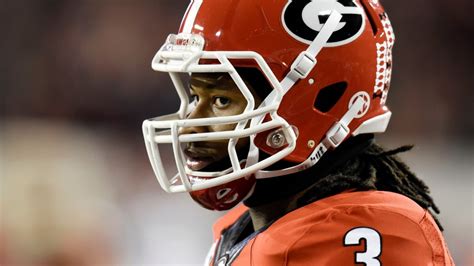 Georgia Bulldogs’ football helmets through the years