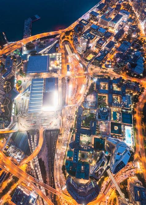 Aerial View of City Buildings during Night Time · Free Stock Photo