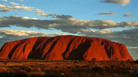 Crowds surge to Uluru, Australia's sacred red rock, before climbing ban ...