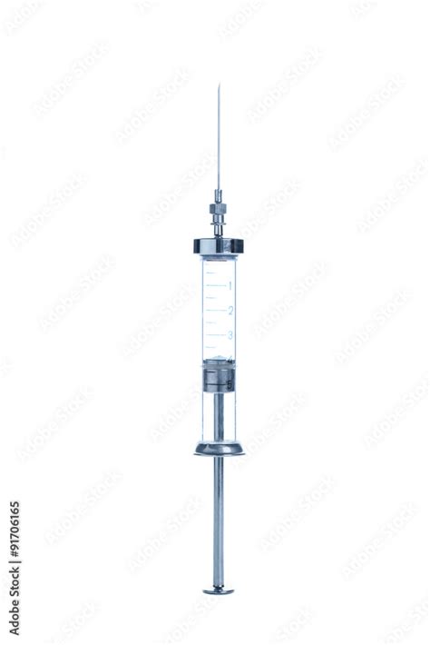 Old glass multiple use syringe with needle Stock Photo | Adobe Stock