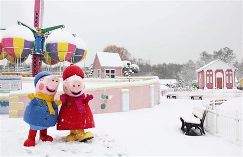 Peppa and George in the snow in Peppa Pig World at Christmas time https ...