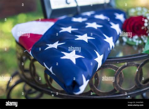 Veterans memorial American flag folded military style Stock Photo - Alamy