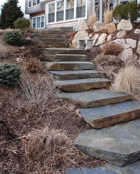 Rough-Hewn Stone Staircase and Retaining Wall - K&R Landscape