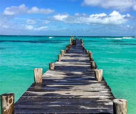 cancun boardwalk into ocean - Travel Off Path