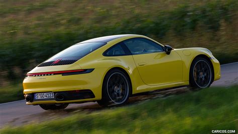 2020 Porsche 911 Carrera Coupe (Color: Racing Yellow) - Rear Three ...