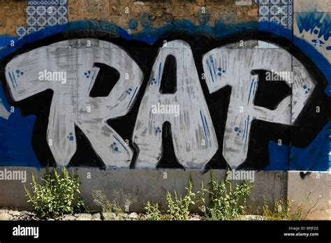 Graffiti says "Rap" on an urban wall Stock Photo - Alamy