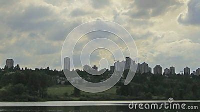 Deer Lake in Burnaby BC Canada with City Skyline View Moving Clouds ...