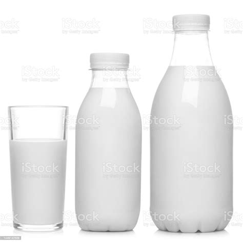 Milk Bottles And Glass Of Milk Set On White Stock Photo - Download ...