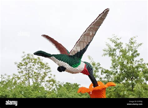 A giant hummingbird sculpture made of Lego bricks by artist Sean Kenney ...