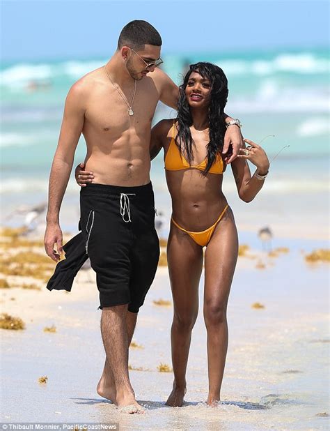 Magic Johnson's daughter Elisa packs on the PDA with bf in Miami Beach