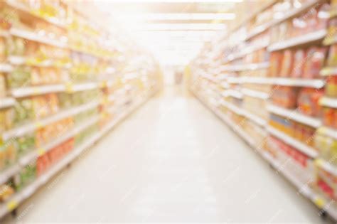 Premium Photo | Empty Supermarket aisle shelves abstract blur defocused ...