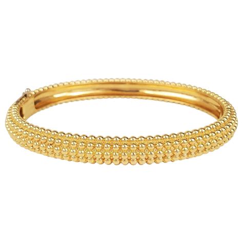 Van Cleef and Arpels Perlée Yellow Gold Bangle at 1stDibs