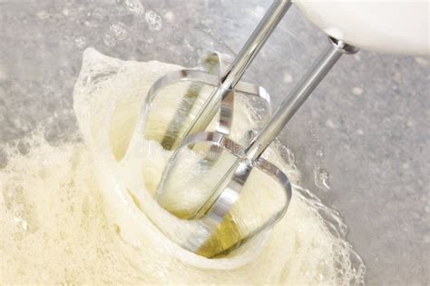 Whisking raw egg whites stock image. Image of whites, food - 2123113