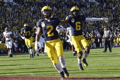 College Football Playoff: Corum, defense lead Michigan over Alabama in ...