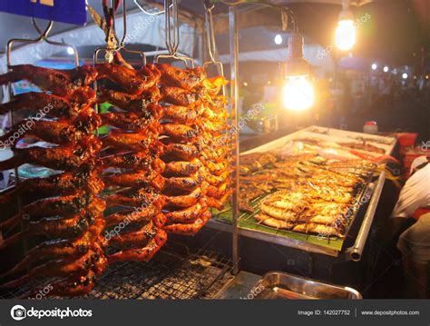 Street food in Kota Kinabalu — Stock Photo © YuryBirukov #142027752