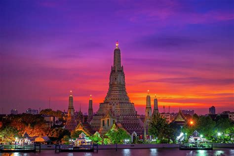 Sunset At Wat Arun Photograph by Saichon Sutthisin