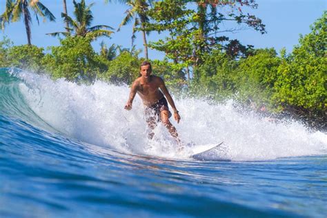 Surfing a Wave. Bali Island. Indonesia Stock Photo - Image of bali ...