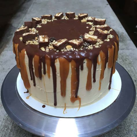 The Ultimate Snickers Cake - Chelsweets